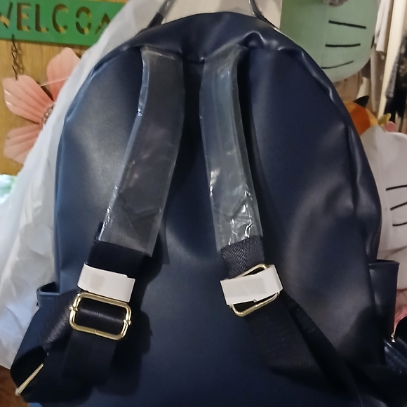 London Fog Quilted Backpack - Navy and Gold